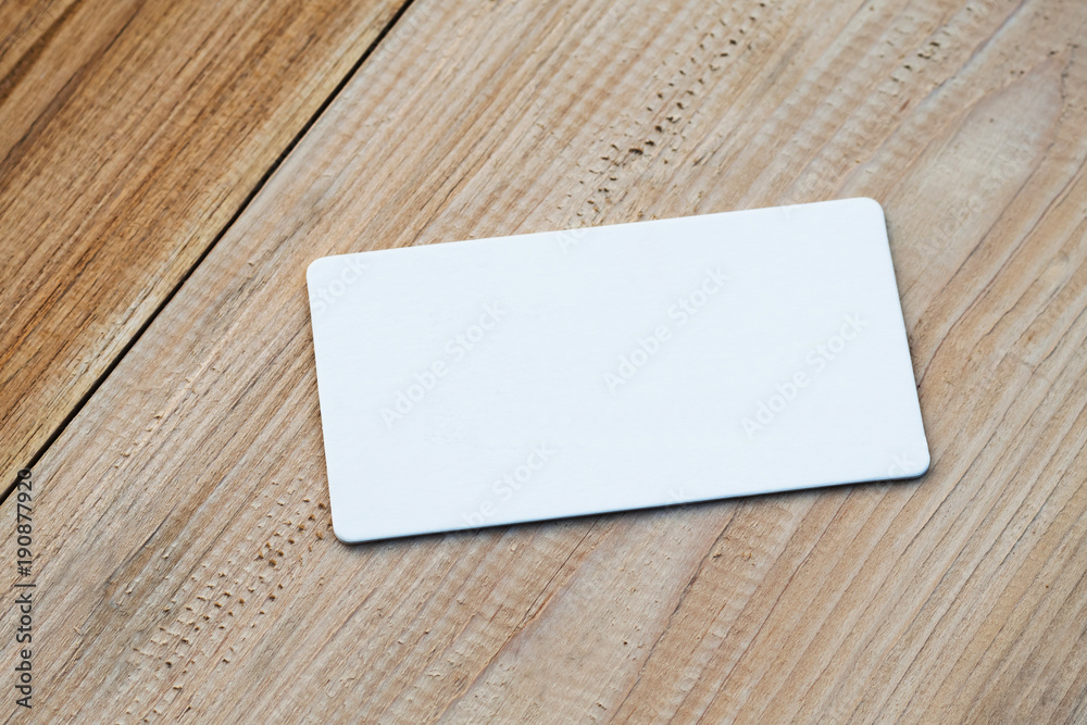 white business card on table