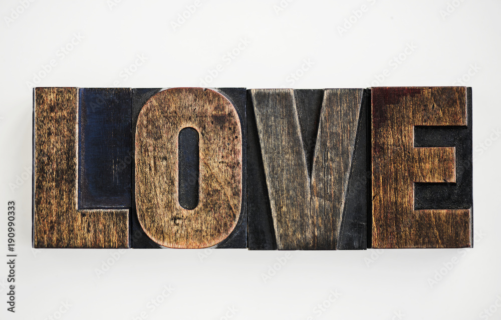 Closeup of the word "Love" isolated on white background