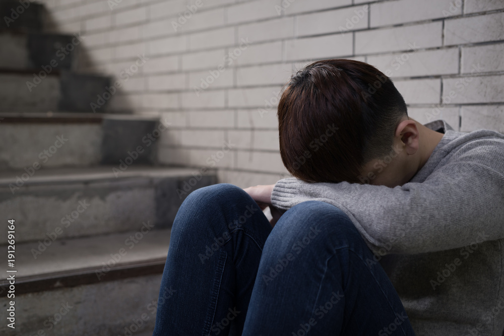 depressed man sit in underground