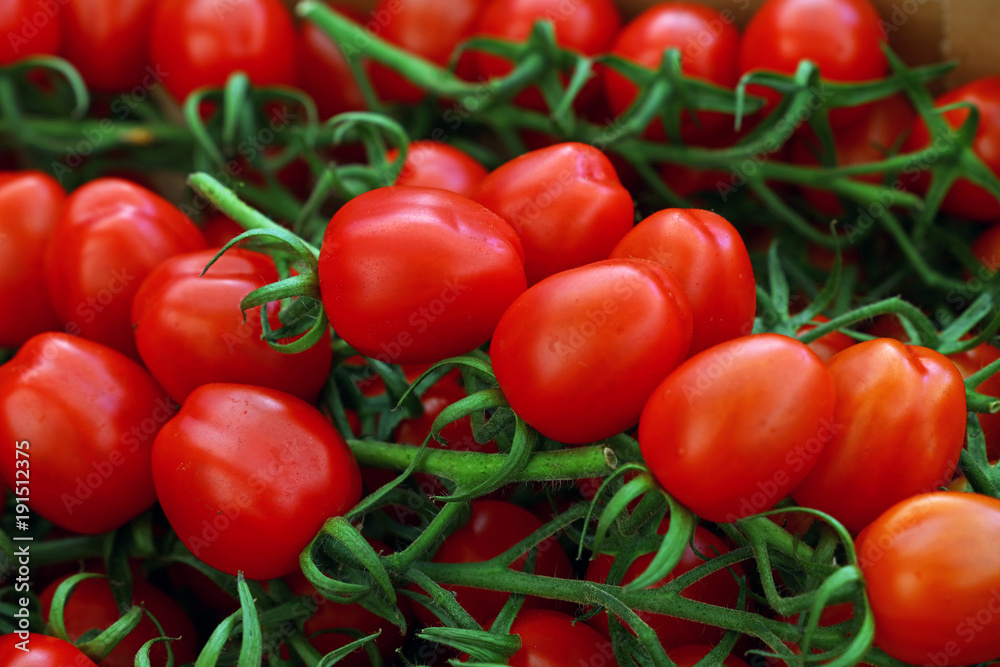 Close up fresh red cherry tomatoes in retail