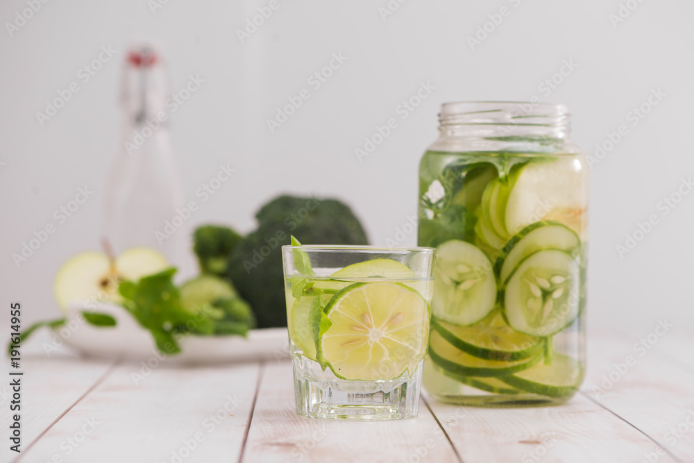 Detox water with vegetables and fruits. Diet healthy eating and weight loss.