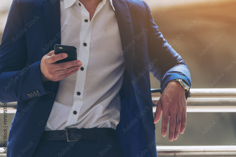 Business man using smartphone