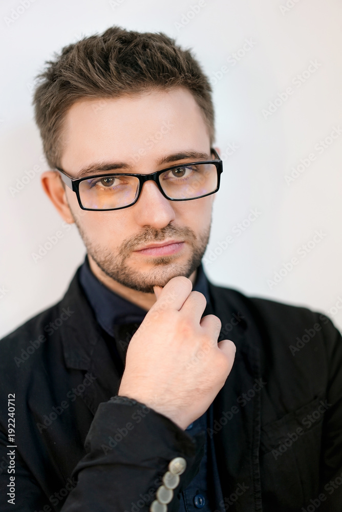 Handsome man with glasses isolated on white background