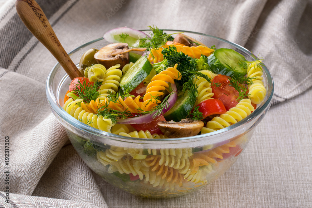 Bowl of pasta salad . Italian food.