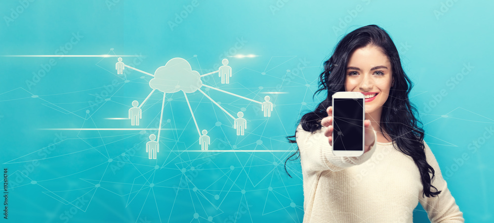 Cloud Computing with People with young woman holding out a smartphone in her hand