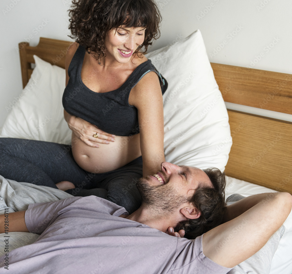 Couple in bed together