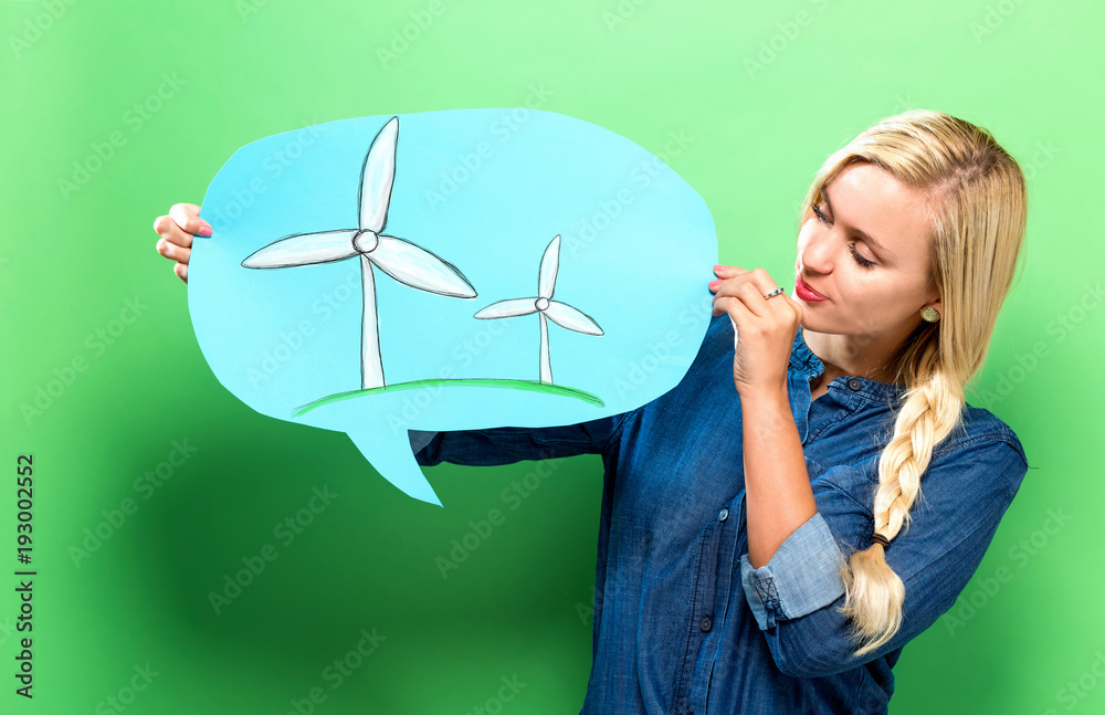 Windmills with young woman holding a speech bubble