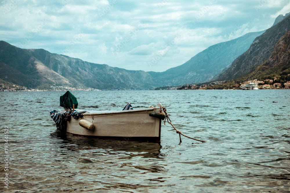 Boat in the bay on a cloudy day.