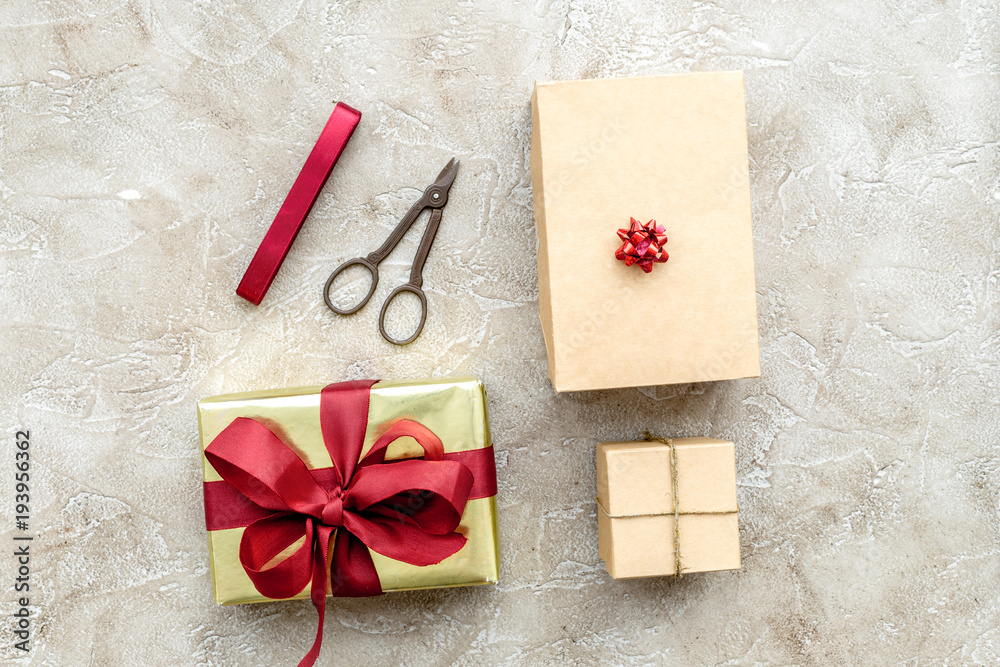 wrapping gifts in box for holiday top view mock up