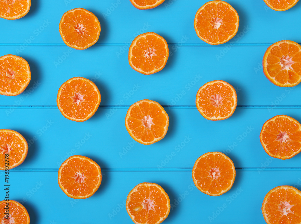 Tangerine on wood table.