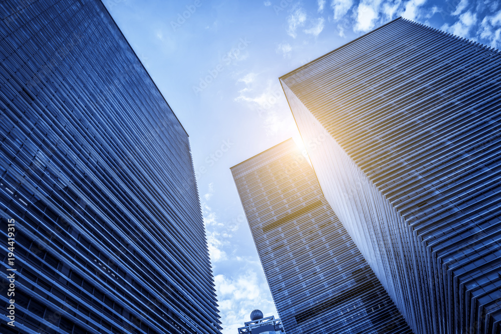 Low angle view of skyscrapers architectural glass