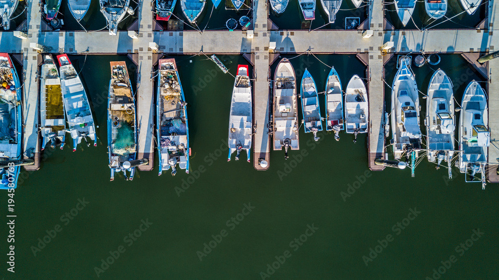 Aerial view Yacht parking, A marina lot, Yacht and sailboat is moored at the quay, Aerial view by dr