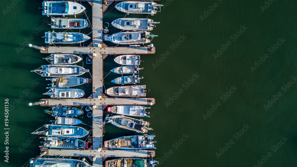 Aerial view Yacht parking, A marina lot, Yacht and sailboat is moored at the quay, Aerial view by dr