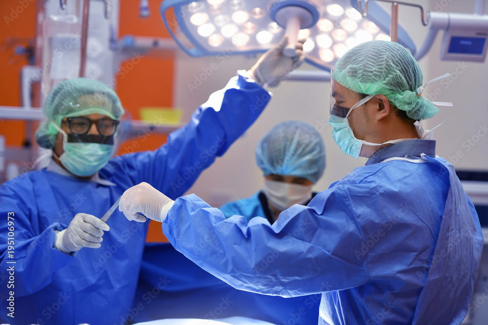 Team surgeon at work on operating room in hospital