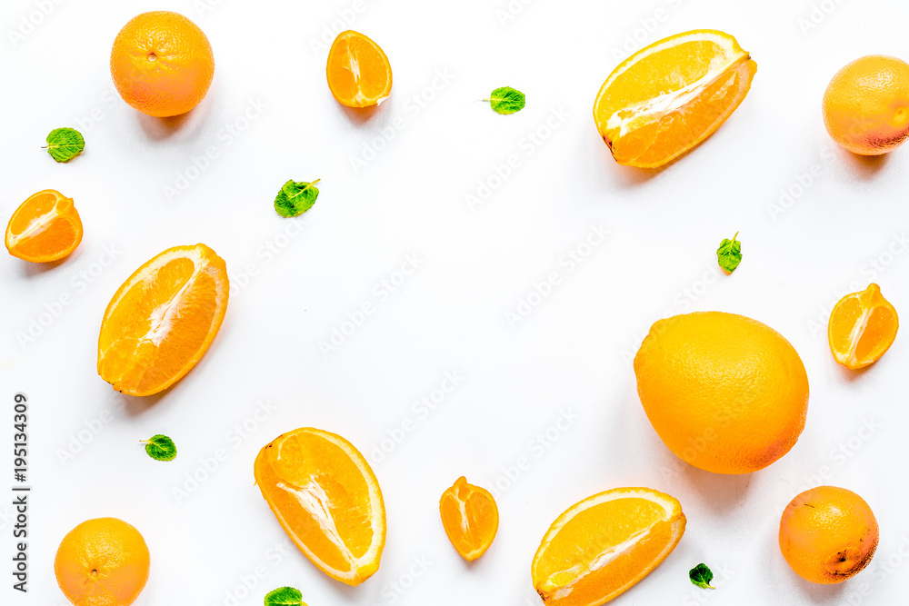 orange with mint on white background top view mock-up