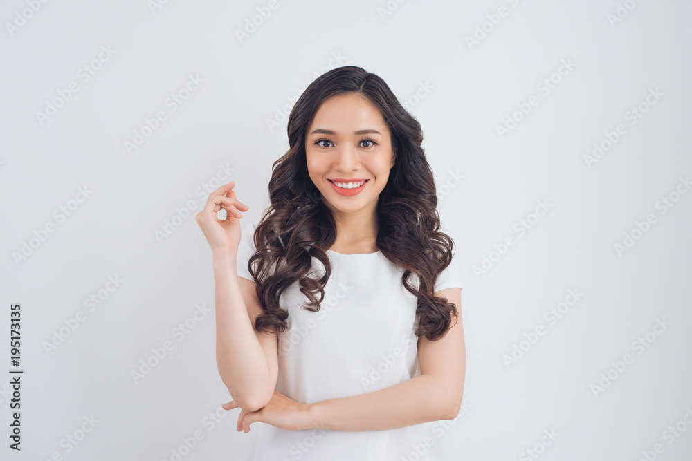 Friendly smiling young pretty asian woman portrait.