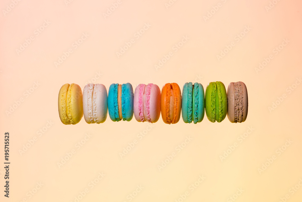 Fly falling sweet macaroon. Minimal concepts falling macaroons