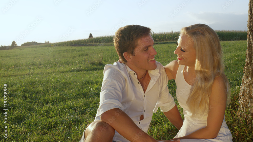 CLOSE UP Affectionate couple in love enjoying each others company