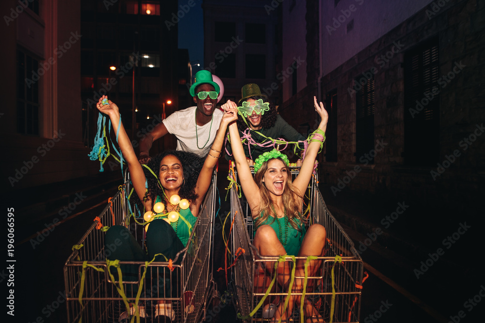 St.Patricks day celebration on city street at night