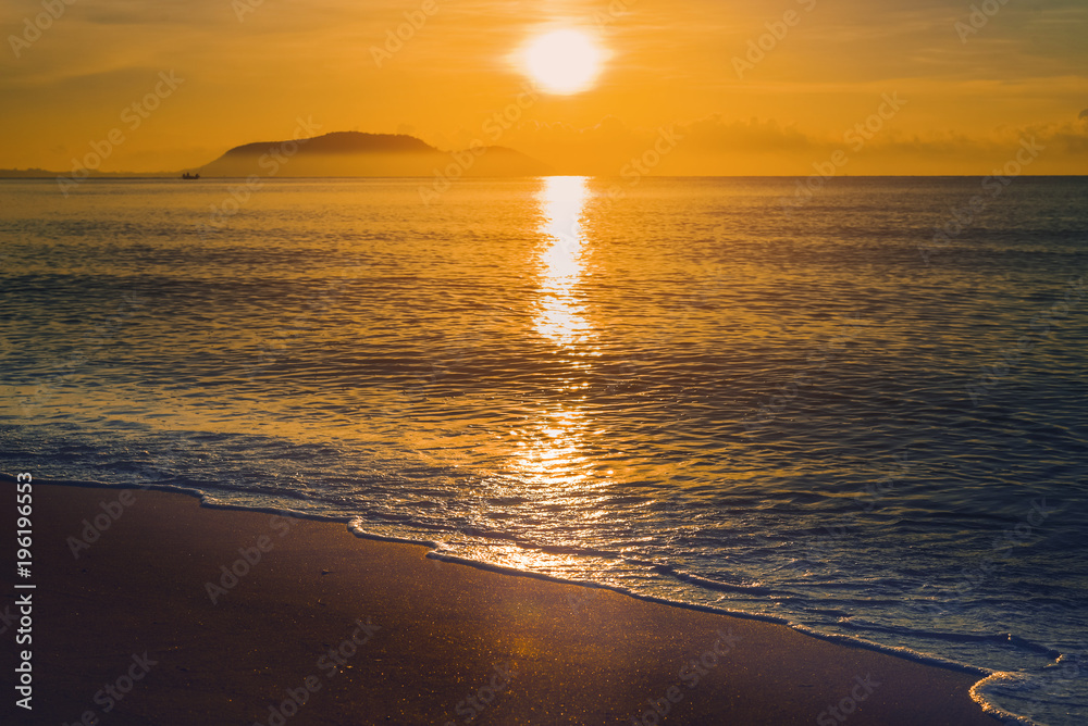 Sunset in nice sky over sea and mountains.