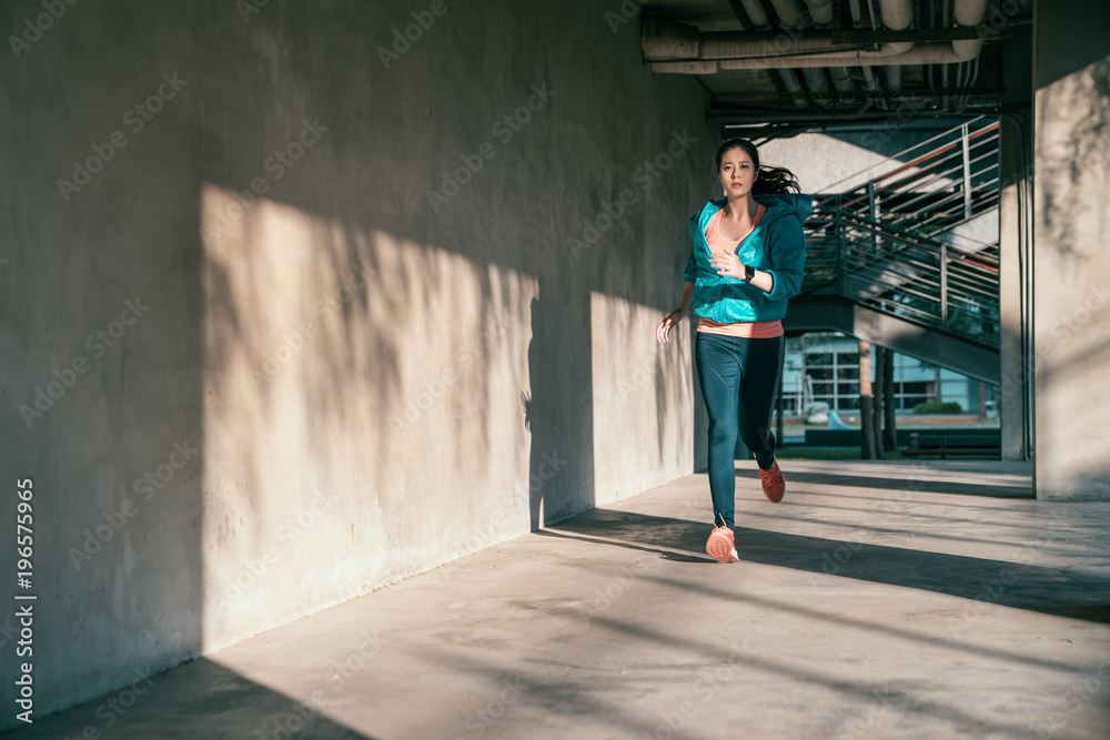 Woman doing running exercise cardio outdoor.