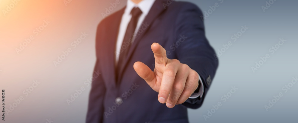 Businessman pointing finger