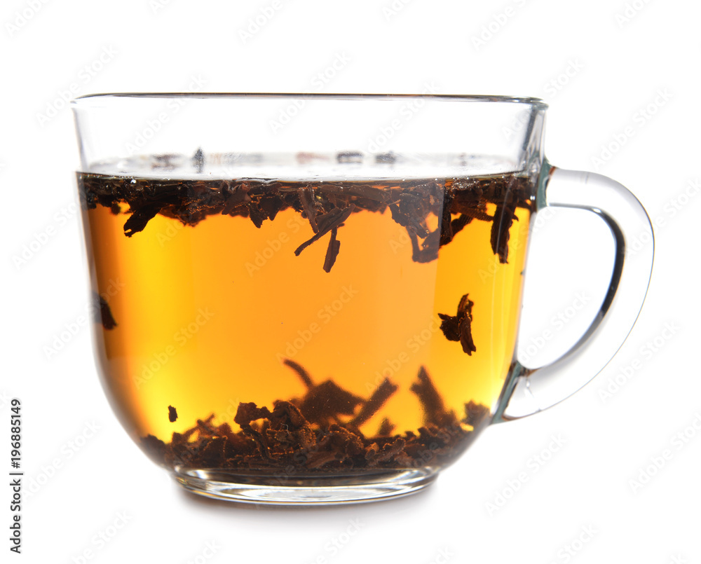 Glass cup of hot tea on white background