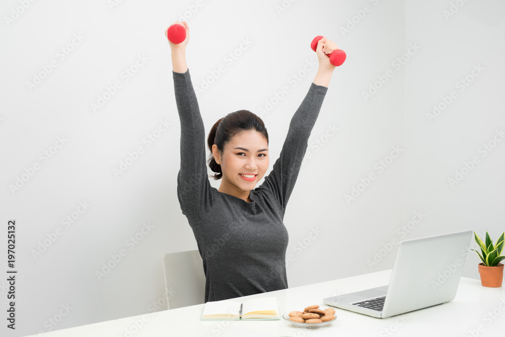 Business woman working and workout at her office