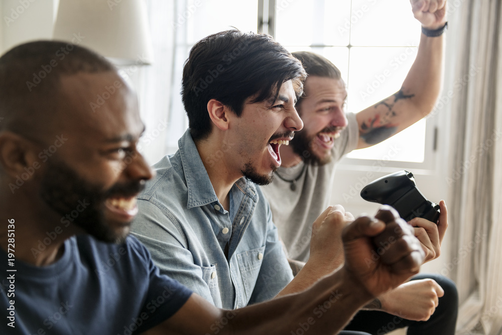 Men cheering on their sports team