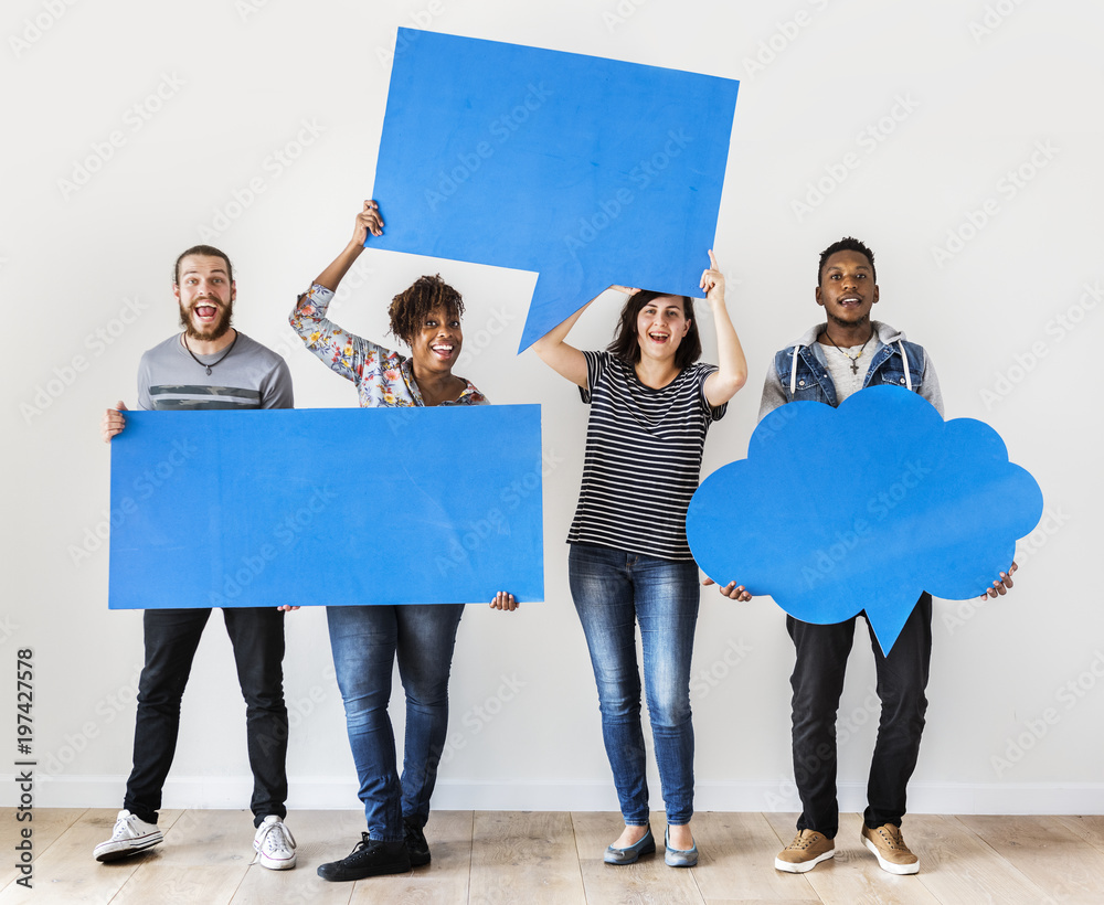 Happy multiracial people holding copyspace speech bubble