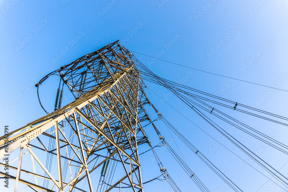 transmission pole with blue sky