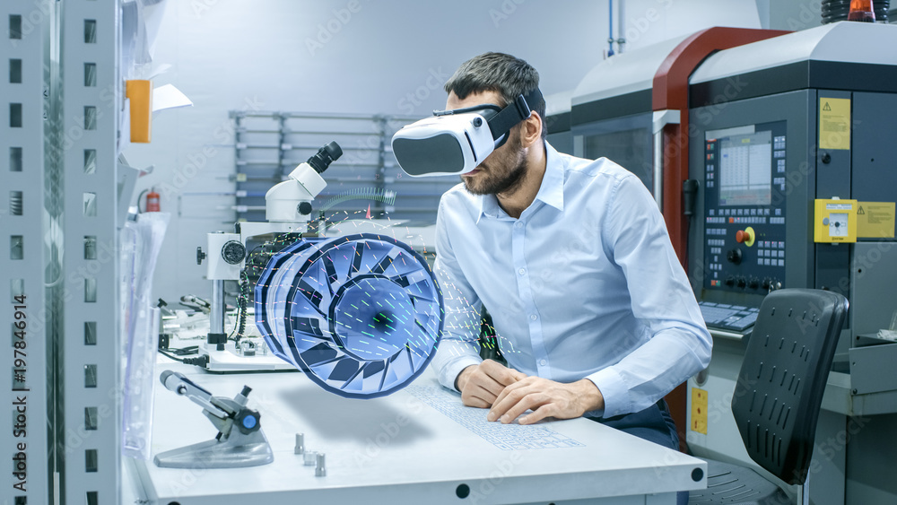 Factory Chief Engineer Wearing VR Headset Designs Engine Turbine on the Holographic Projection Table