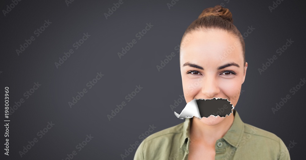 Woman with torn paper on mouth