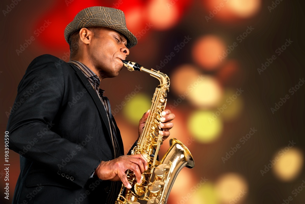 Ð¬an playing on saxophone