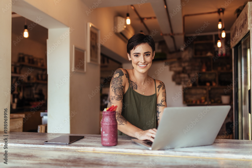 Woman working on laptop computer