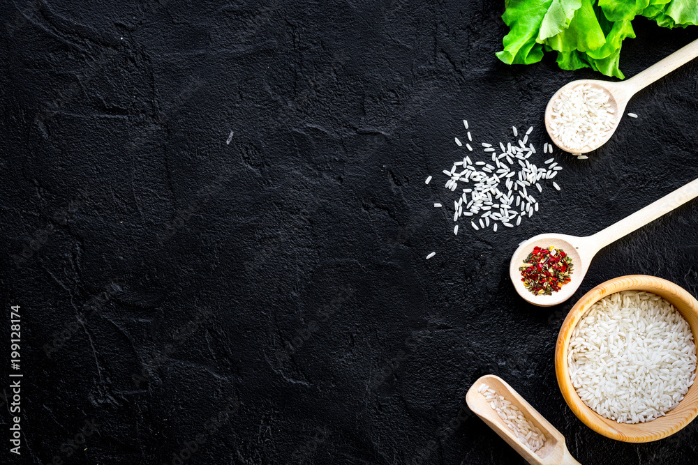 ingredients for paella on dark background top view