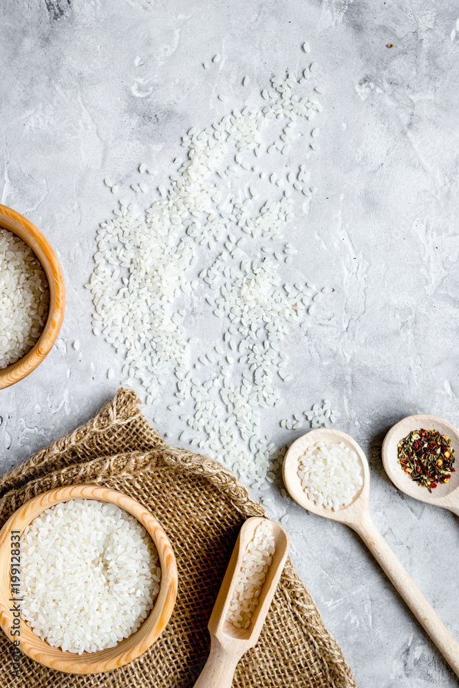 rice for paella on stone background top view mock up