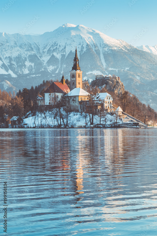 Lake Bled with Bled Island and Castle at sunrise in winter, Slovenia