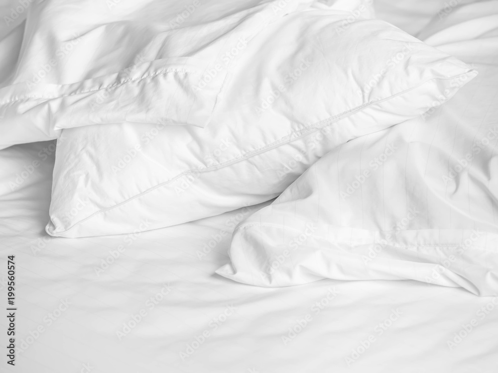 Black and white tone. Pillow and zipper cover on the bed in the bedroom.