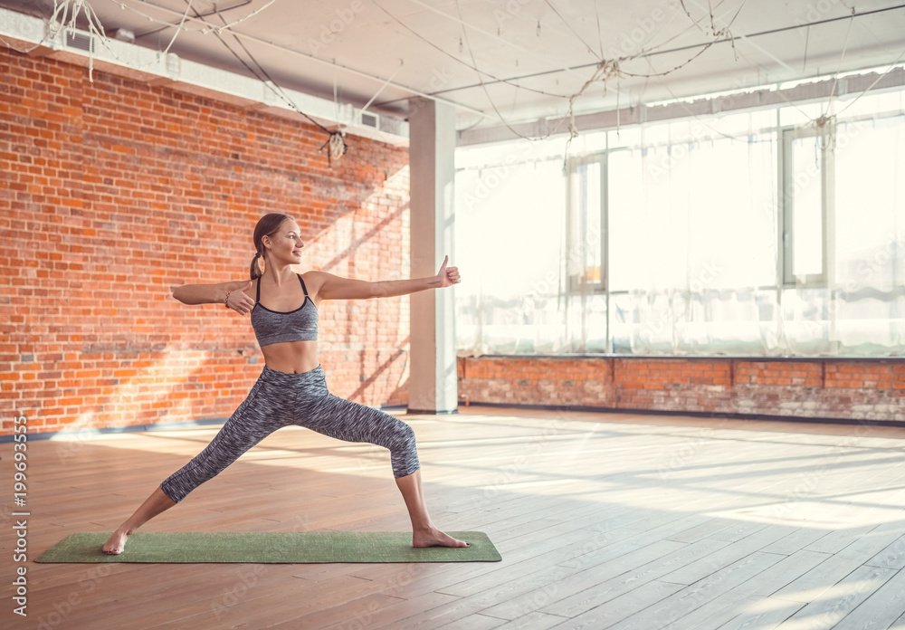 Sport girl practicing yoga