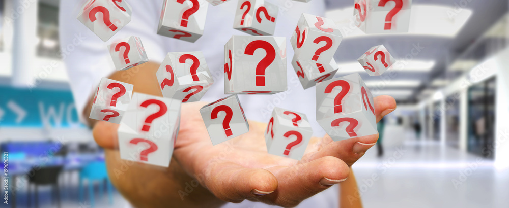 Businessman using cubes with 3D rendering question marks