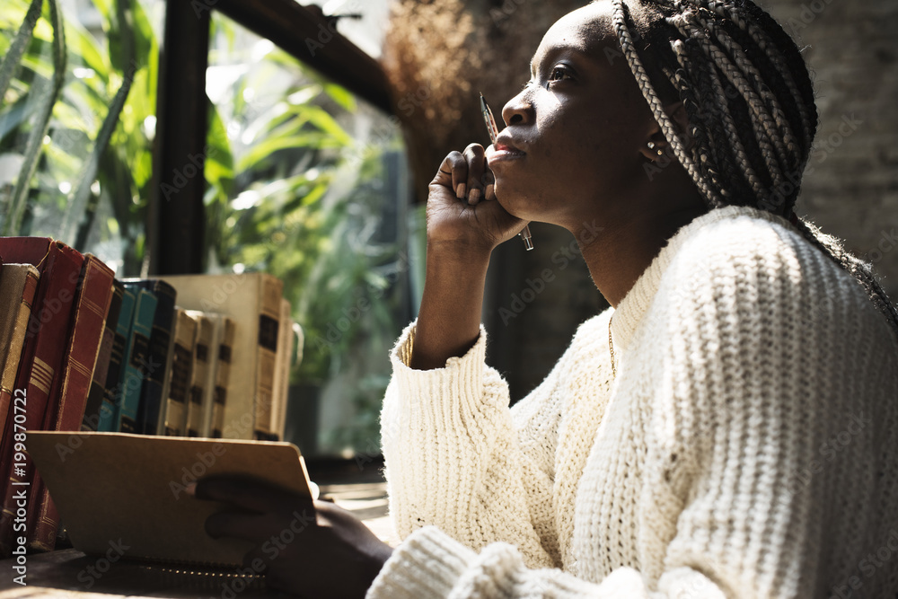 Portrait of black woman with dreadlocks hair