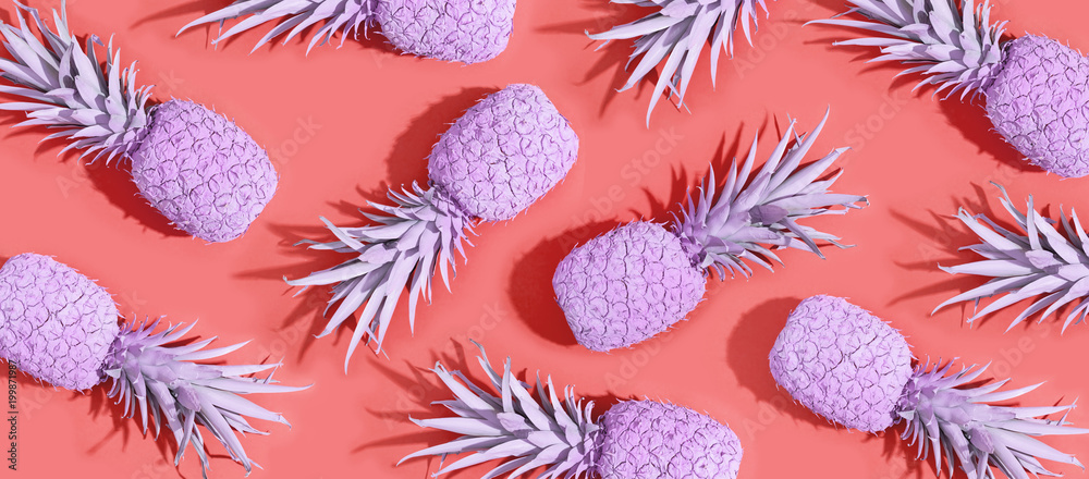 Painted pineapples on a vivid pink background