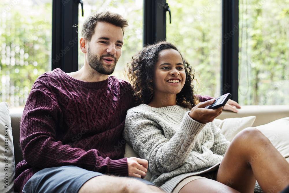 Couple watching a tv show together