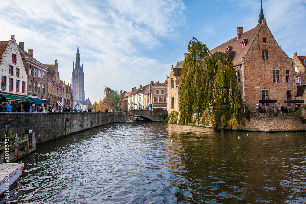 Brugge medieval historic city. Brugge streets and historic center, canals and buildings. Brugge popu