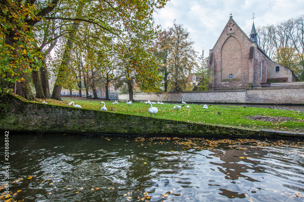 Brugge medieval historic city. Brugge streets and historic center, canals and buildings. Brugge popu