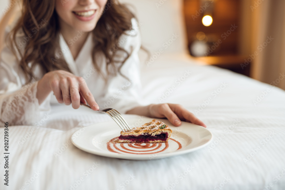 Young girl eating breakfast