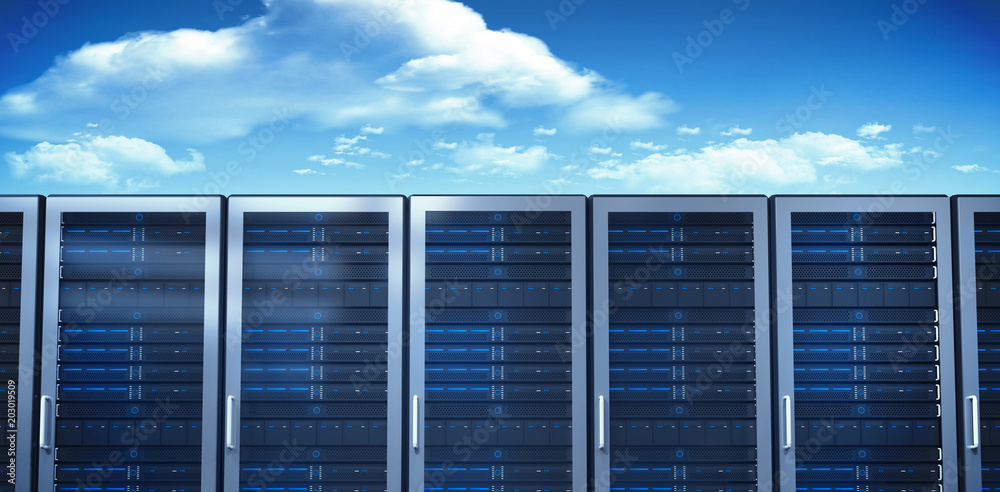 Server towers against bright blue sky with clouds