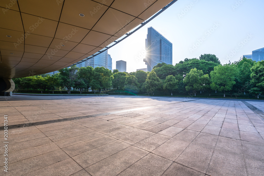 empty marble floor with city skyline