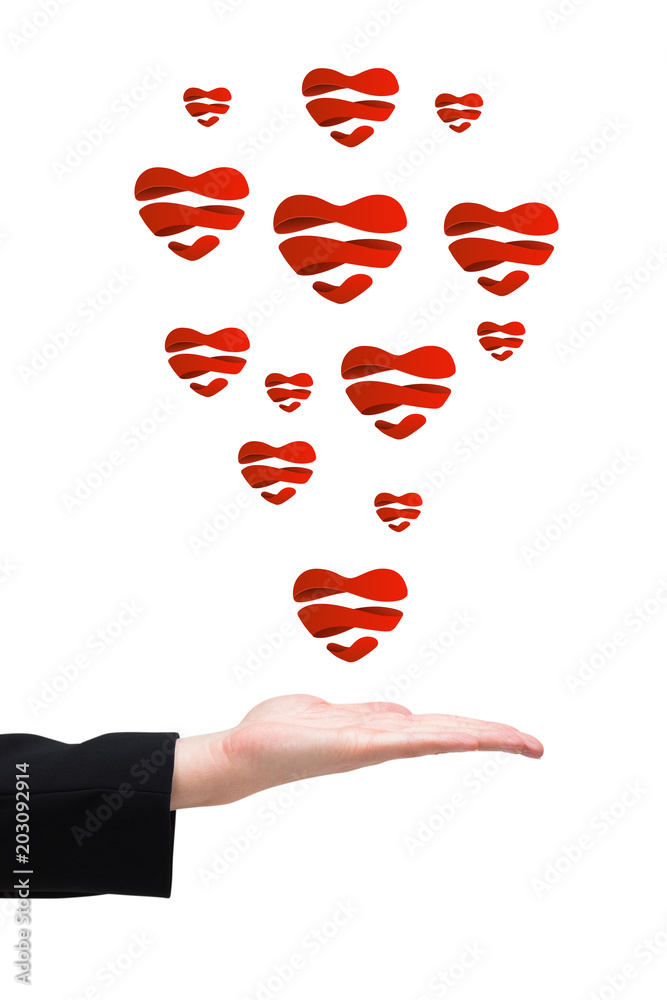 Businesswomans hand presenting against heart